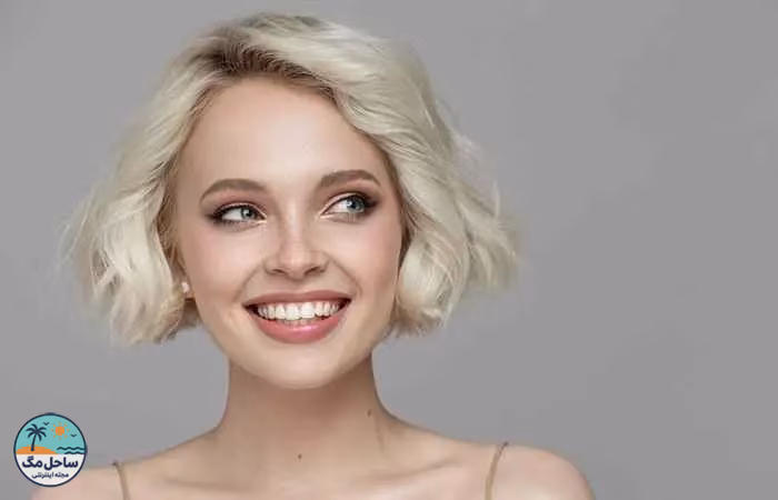 Woman with platinum blonde curly bob hairstyle