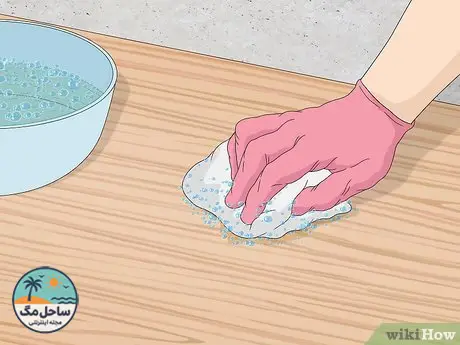 Step 3 Clean the oily area with your solution.