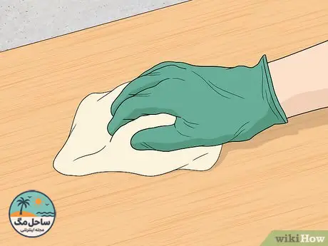 Step 3 Clean the area with a damp cloth.