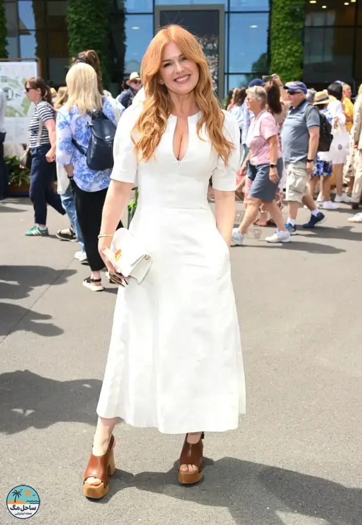 Isla Fisher at Wimbledon wearing a white dress